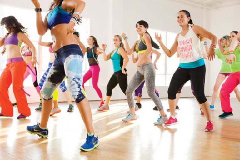 Sync, Sweat, and Smile: The Joyful Impact of Group Aerobic Dance Classes